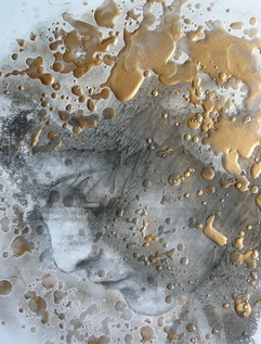 sketch of a woman looking downwards. There is a splatter of gold paint over the drawing.